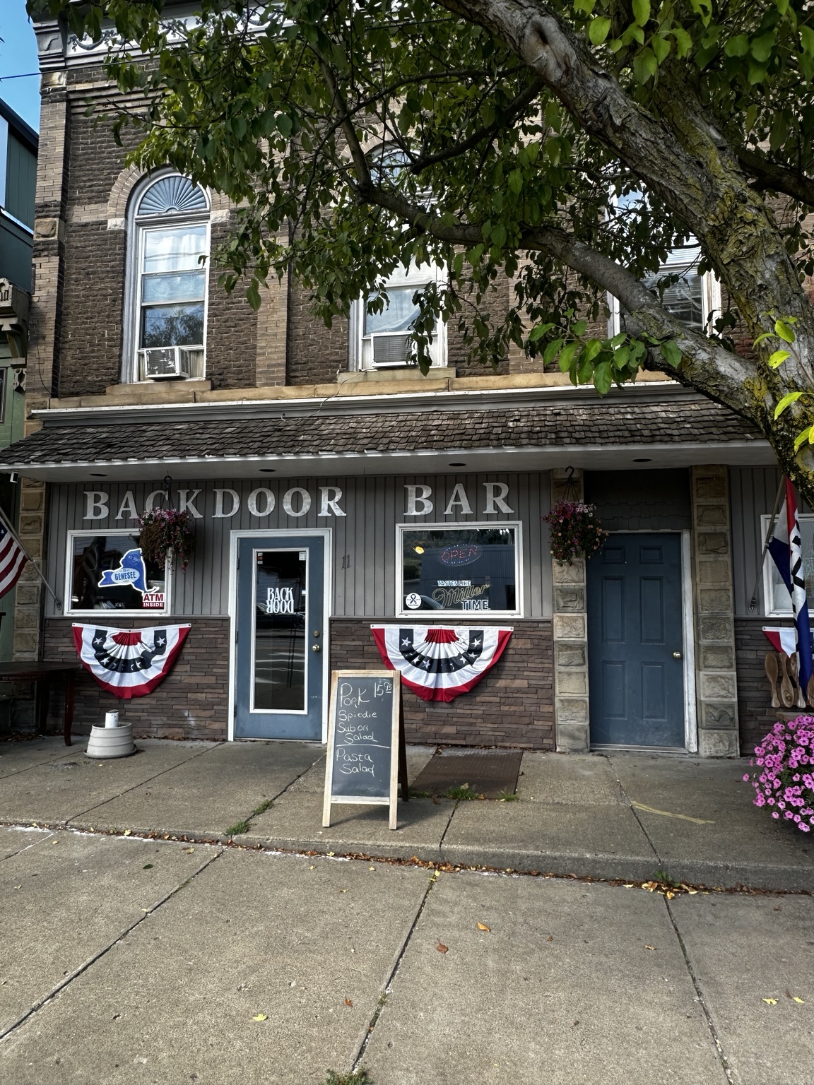 The front entrance of the Back Door Bar and Grille at historic Willsey Hall on West Main Street